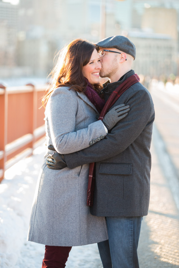 Carolyn and Charles's winter engagement at Stone Arch Bridge in Minneapolis, MN