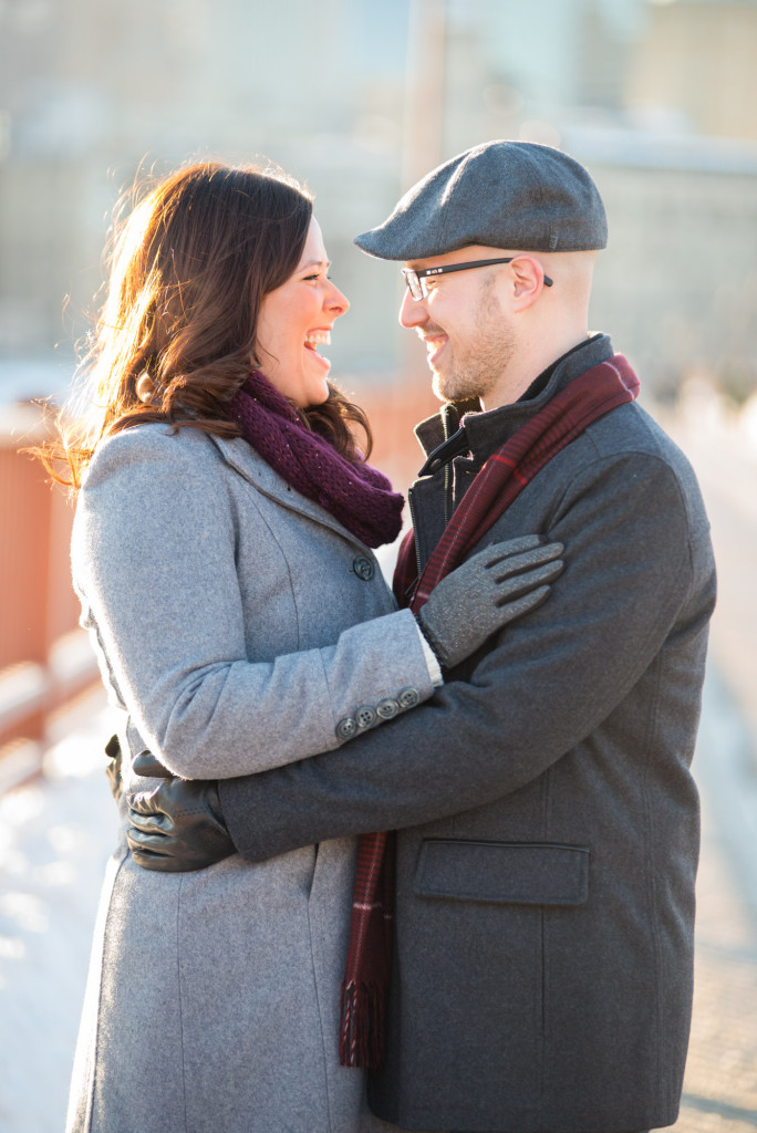 Carolyn and Charles's winter engagement at Stone Arch Bridge in Minneapolis, MN