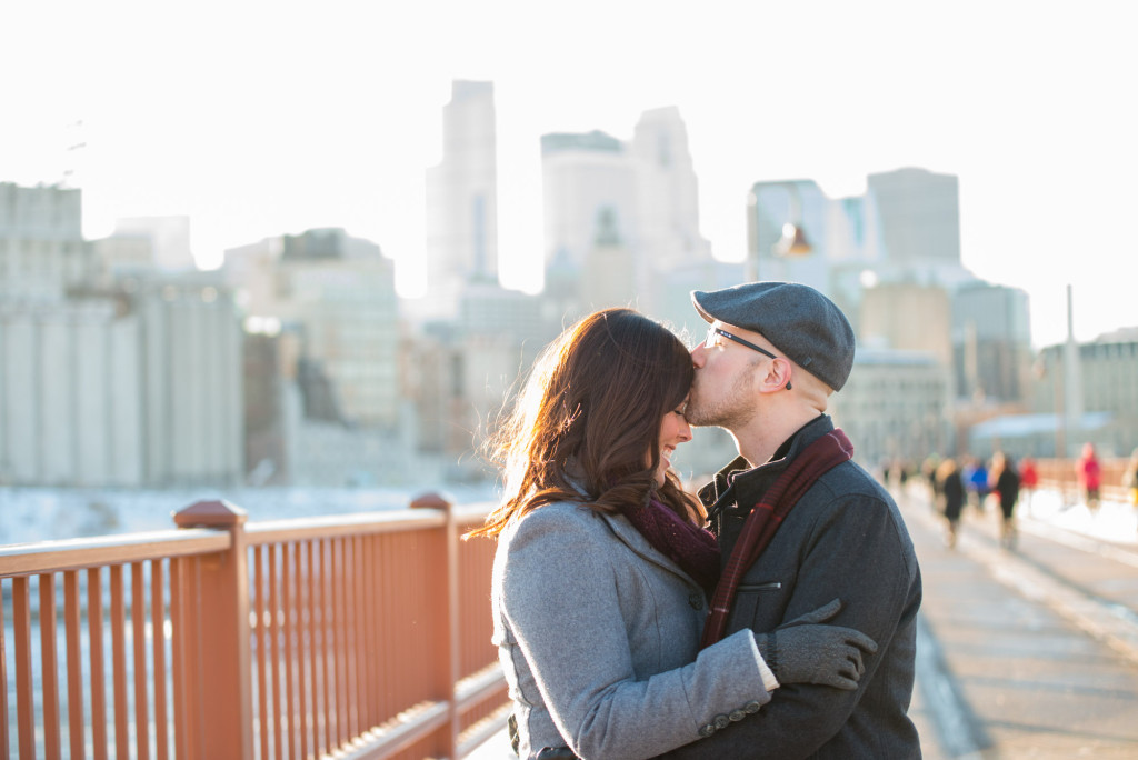 Carolyn and Charles's winter engagement at Stone Arch Bridge in Minneapolis, MN