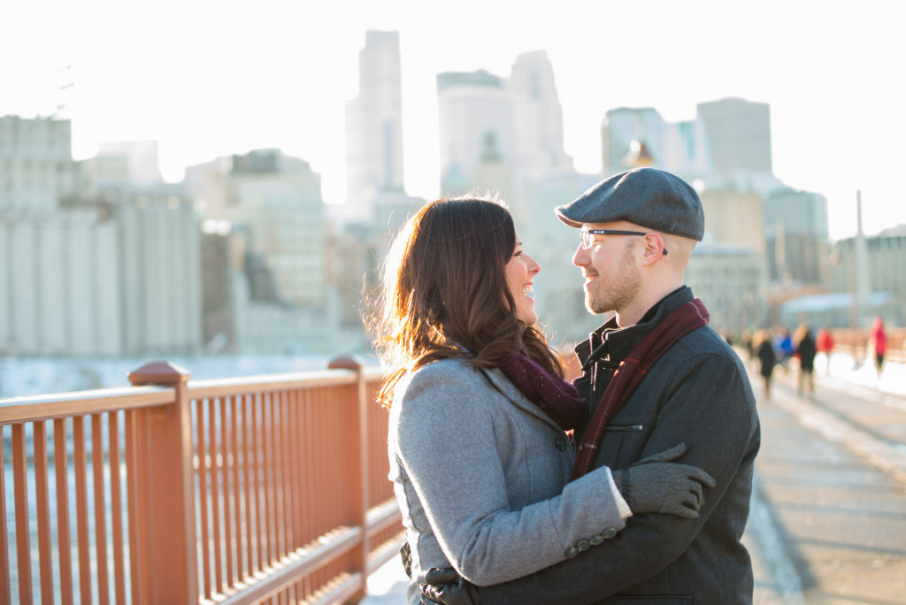 Carolyn and Charles's winter engagement at Stone Arch Bridge in Minneapolis, MN