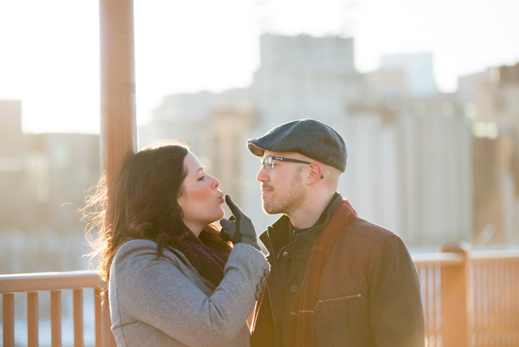 Carolyn and Charles's winter engagement at Stone Arch Bridge in Minneapolis, MN