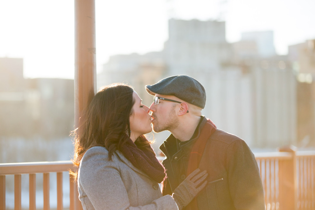 Carolyn and Charles's winter engagement at Stone Arch Bridge in Minneapolis, MN