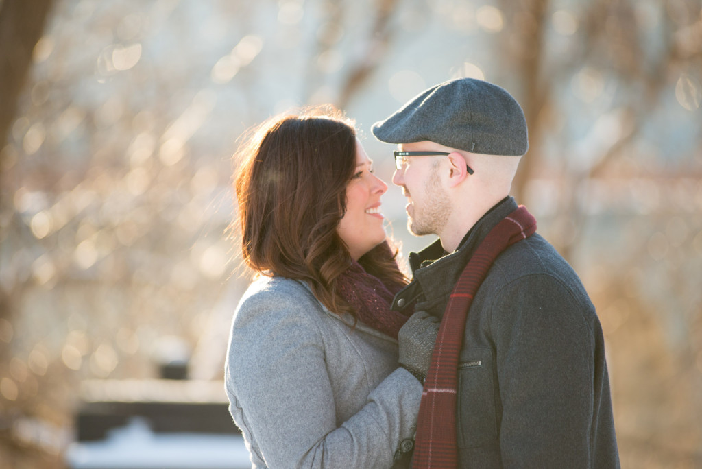 Carolyn and Charles's winter engagement at Stone Arch Bridge in Minneapolis, MN