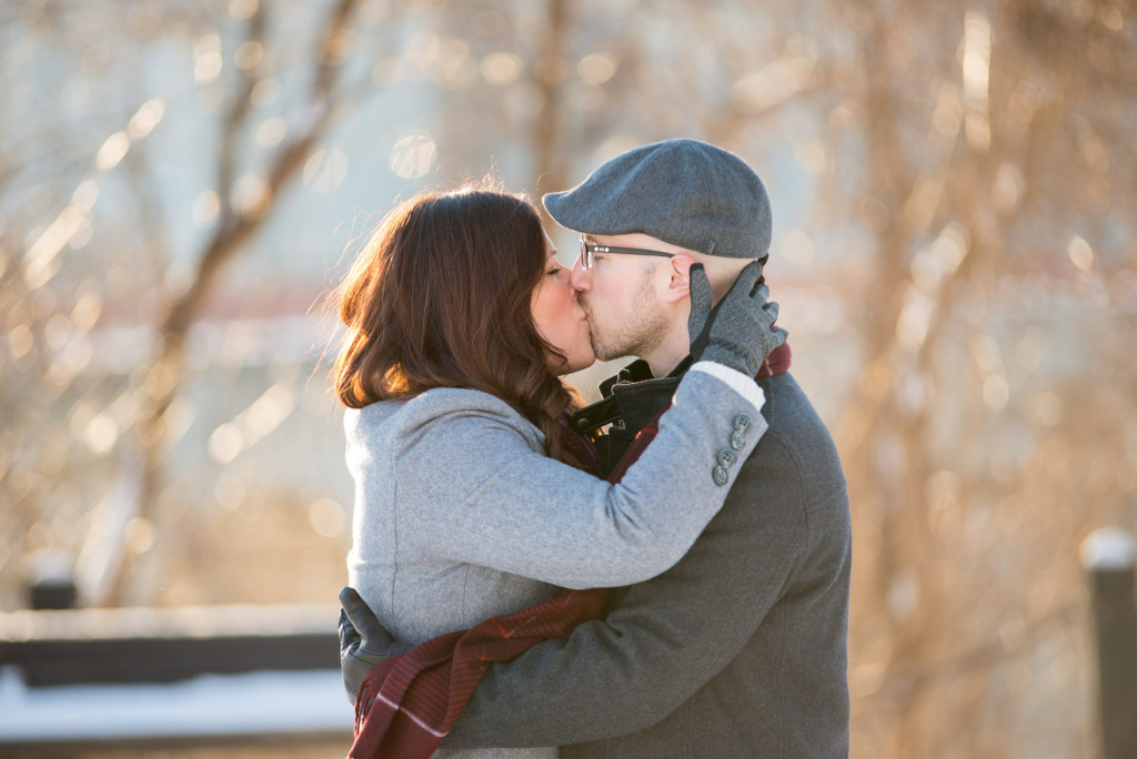 Carolyn and Charles's winter engagement at Stone Arch Bridge in Minneapolis, MN