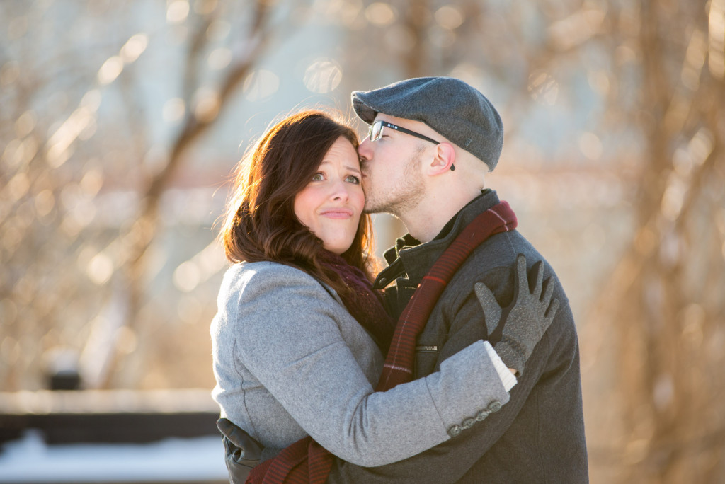 Carolyn and Charles's winter engagement at Stone Arch Bridge in Minneapolis, MN