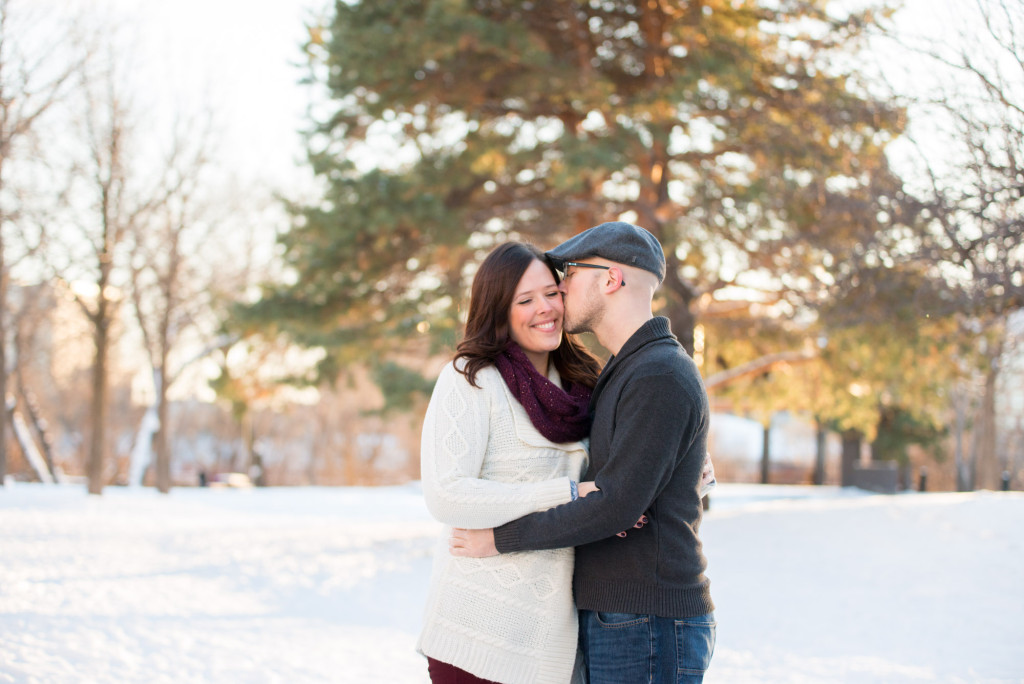Carolyn and Charles's winter engagement at Stone Arch Bridge in Minneapolis, MN