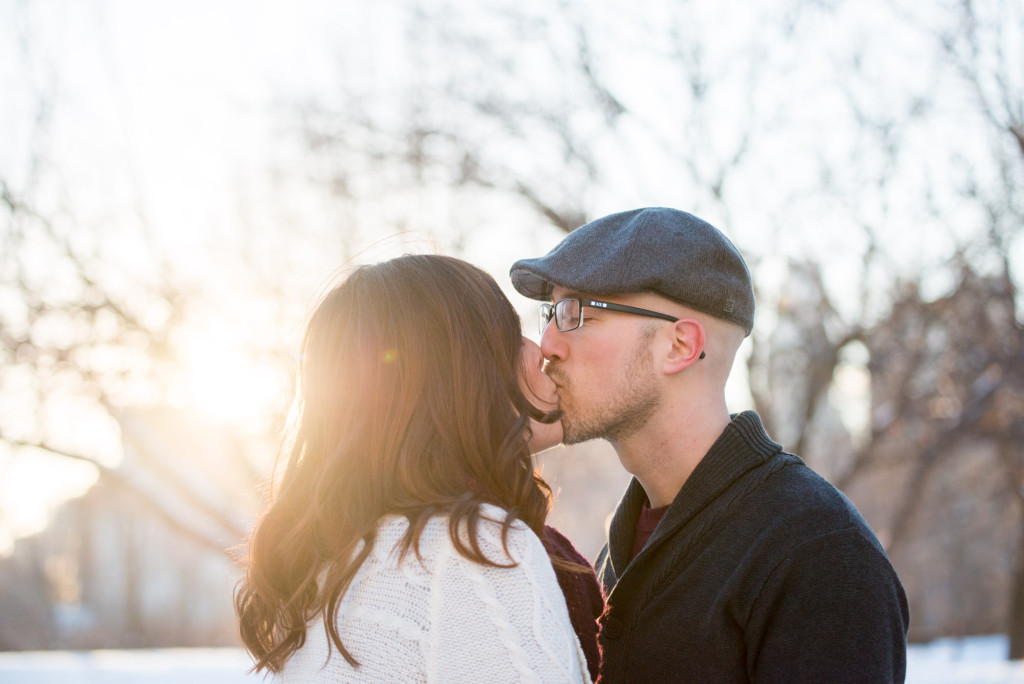 Carolyn and Charles's winter engagement at Stone Arch Bridge in Minneapolis, MN