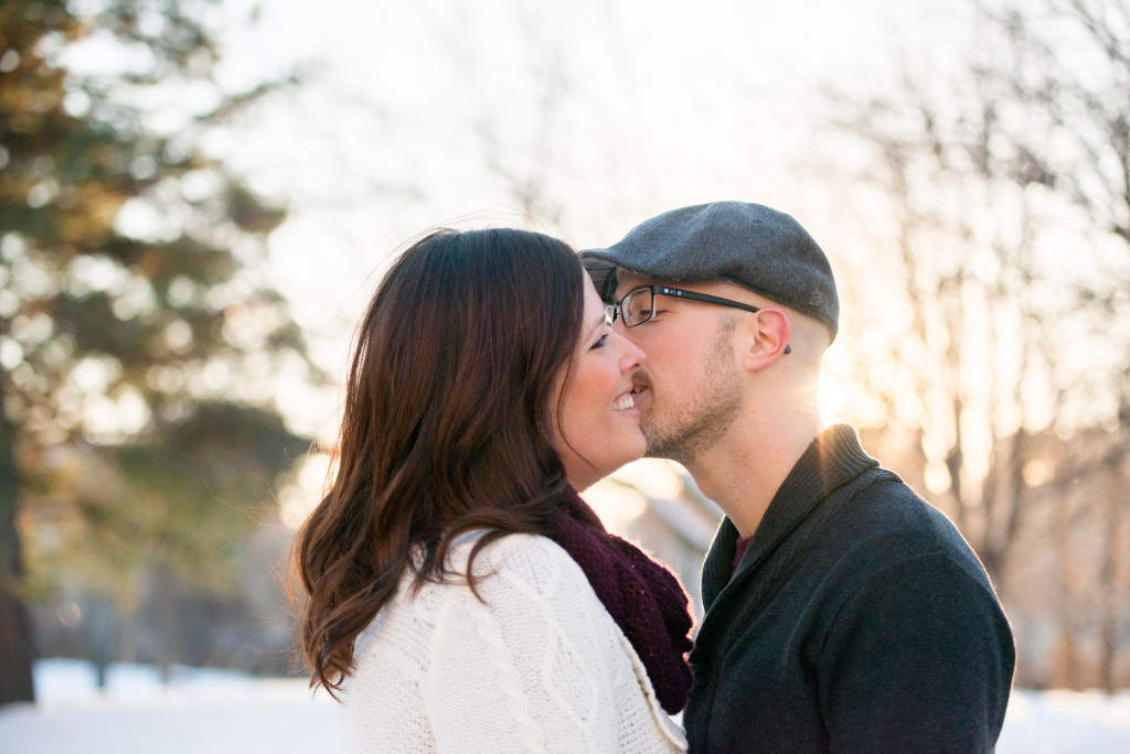 Carolyn and Charles's winter engagement at Stone Arch Bridge in Minneapolis, MN