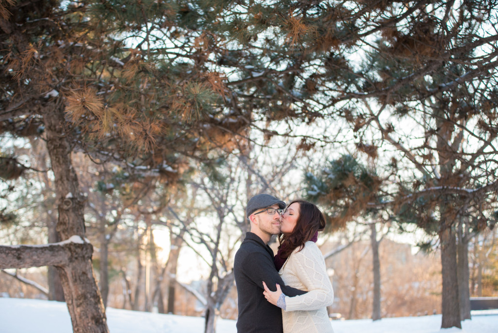 Carolyn and Charles's winter engagement at Stone Arch Bridge in Minneapolis, MN